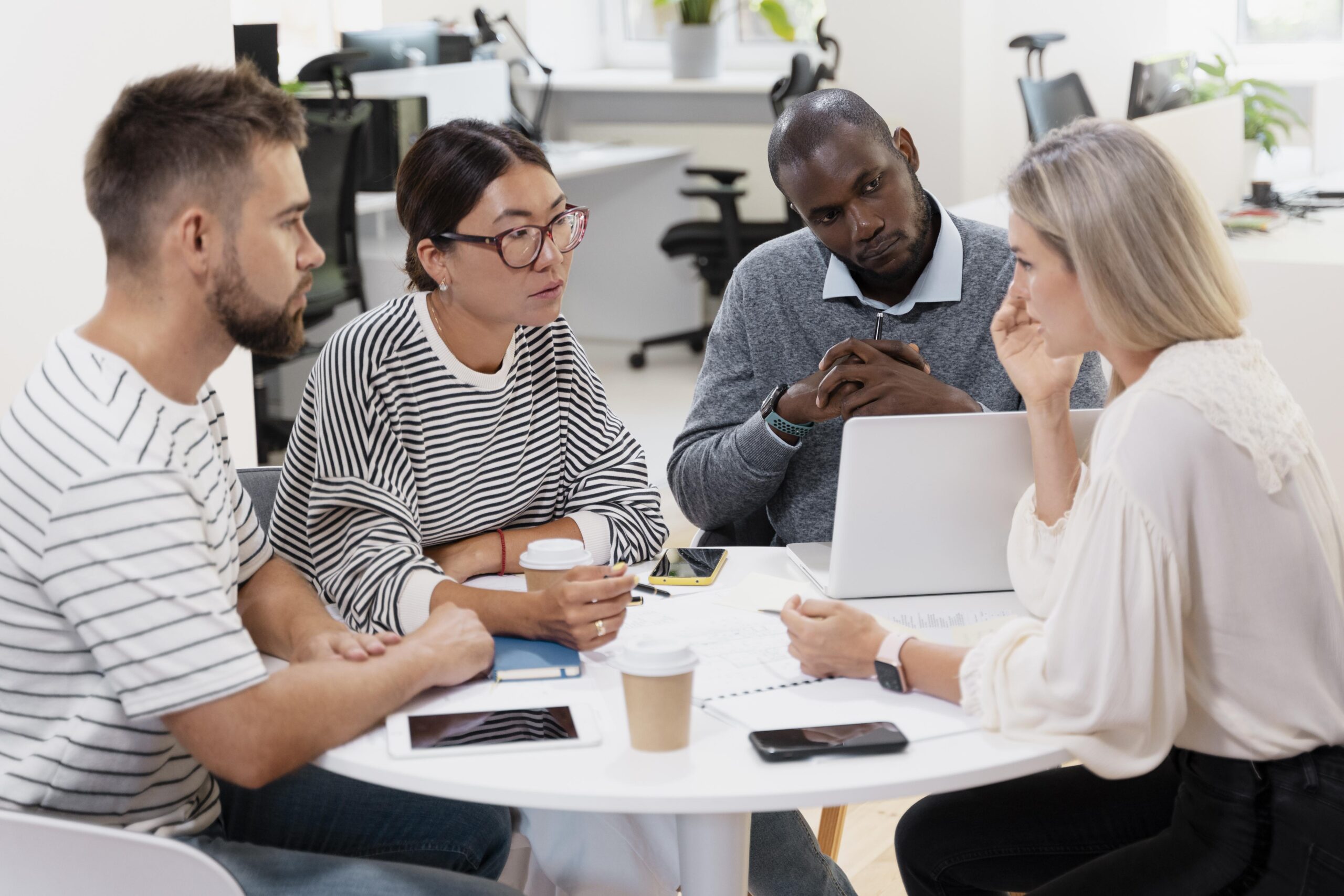 HR-employees-chatting-desk-MyEMS